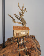 Cliffside Cottage Lamp - Cottage on cliff with jute shade and tree