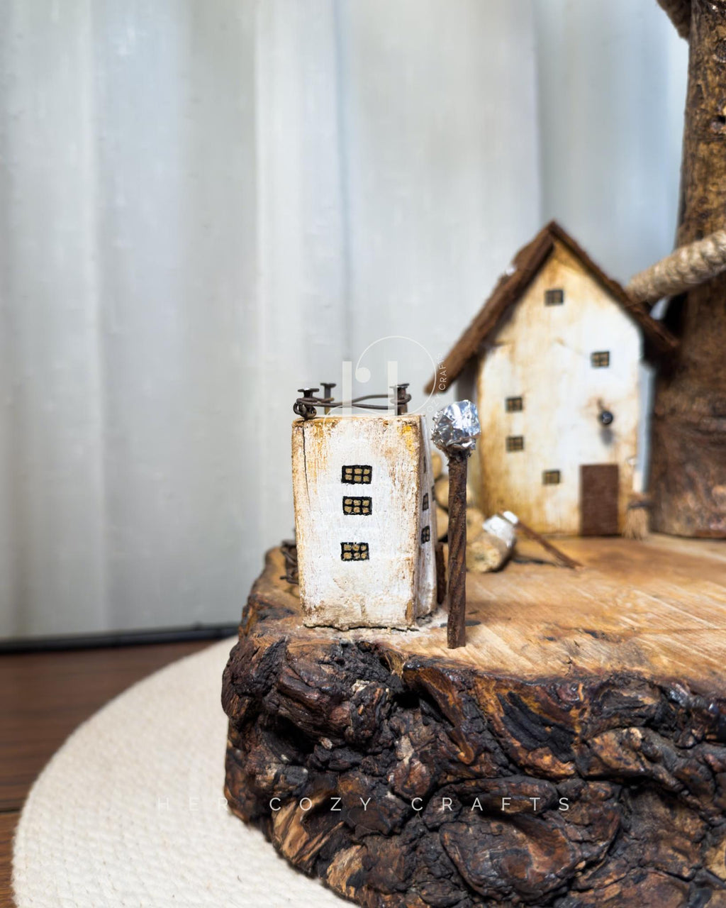 Worklight Signature Lamp - Arched branch with hanging bulb and village base