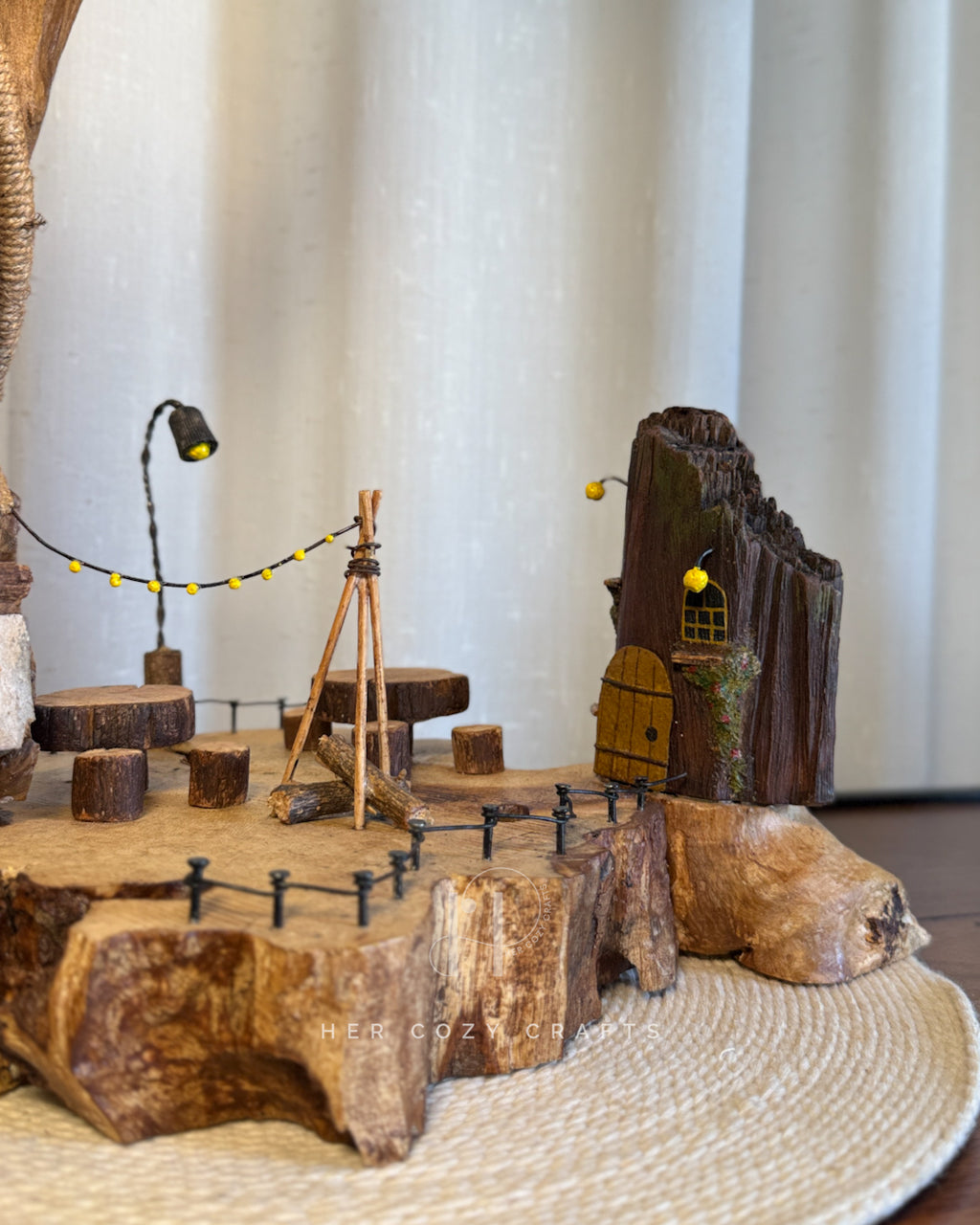 Safari Yard Lamp - Tall driftwood branch with hanging bulb and cafe scene