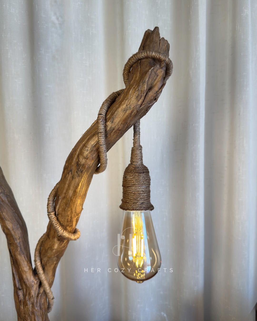 Safari Yard Lamp - Tall driftwood branch with hanging bulb and cafe scene