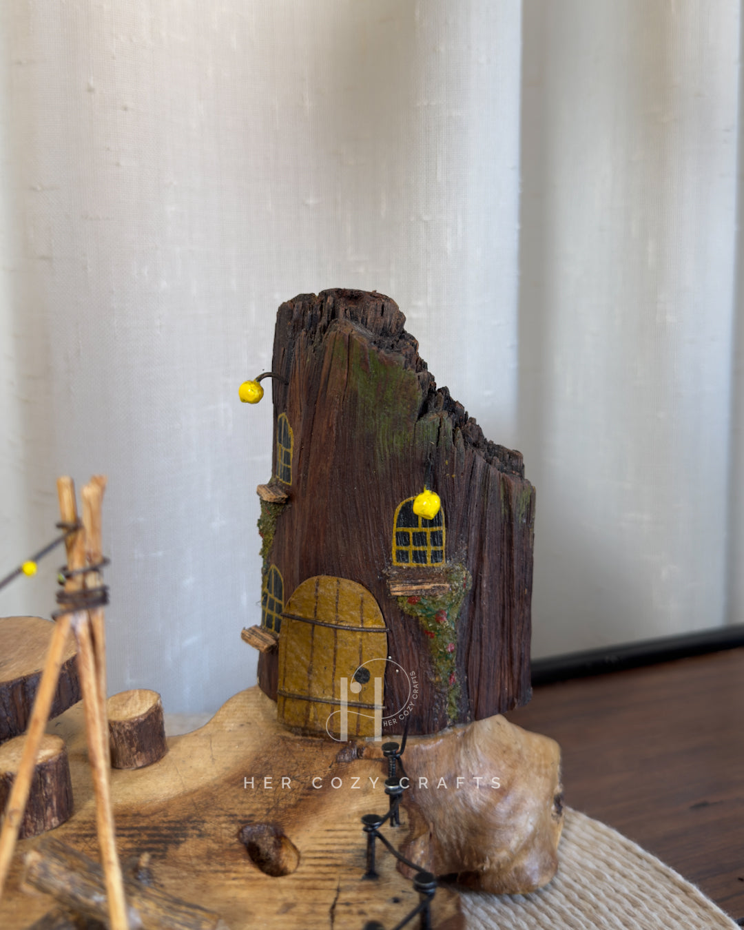 Safari Yard Lamp - Tall driftwood branch with hanging bulb and cafe scene