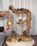 Ladder Cliff Lamp - Sculpted wood arch with drop bulb and tiny houses
