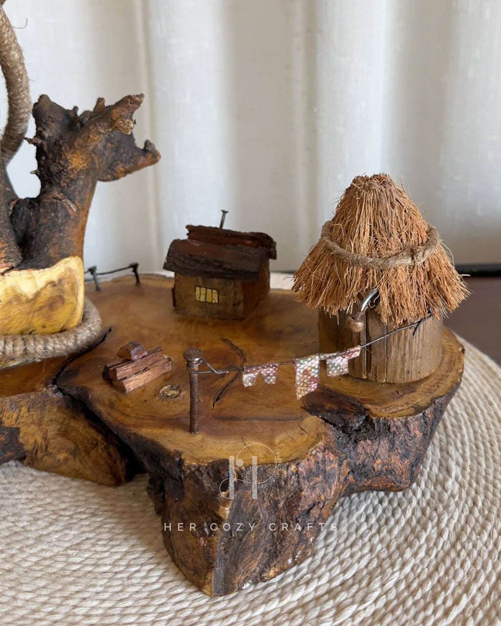 Nestwood Yard Lamp - Tall driftwood stem with hanging bulb and hut scene