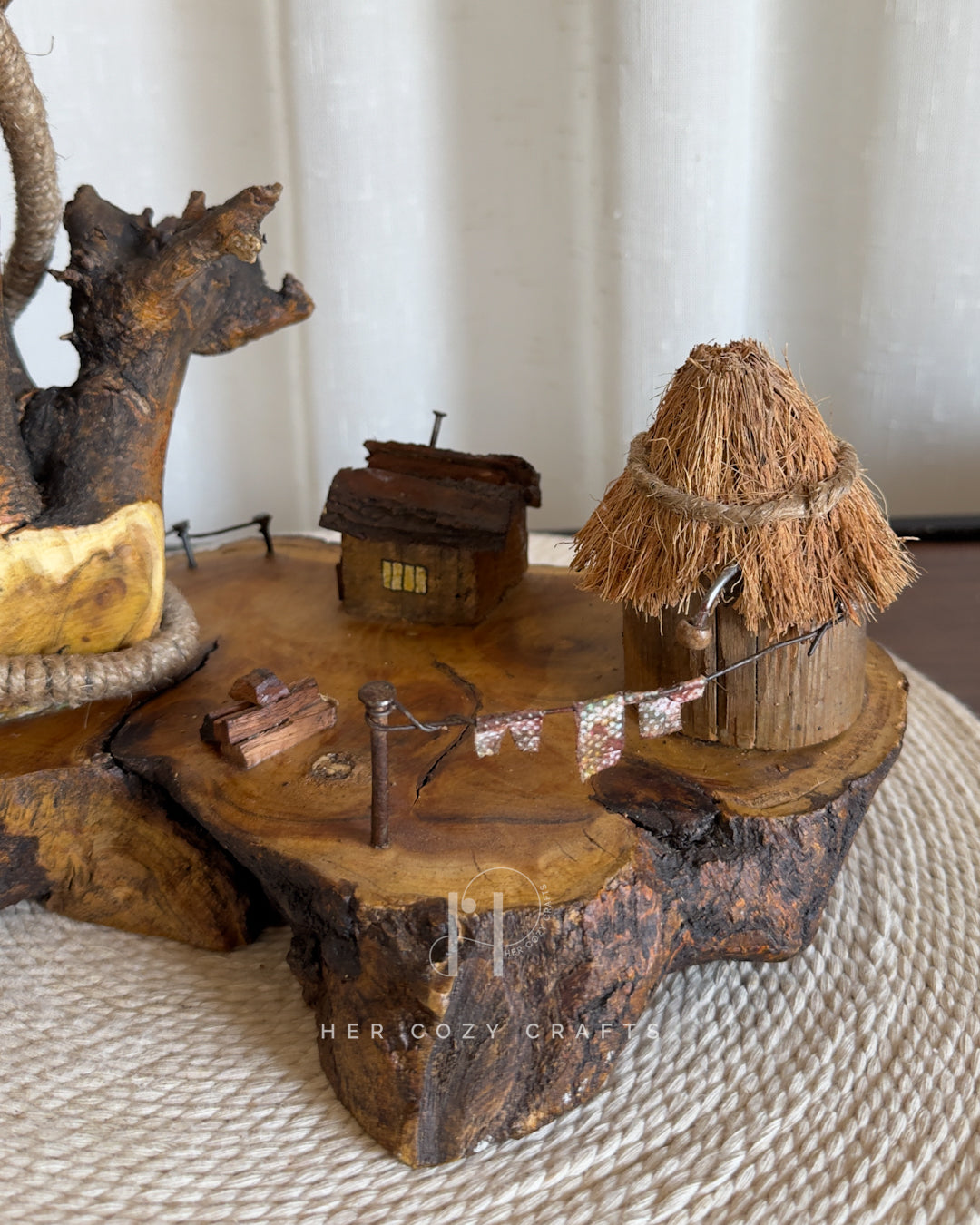 Nestwood Yard Lamp - Tall driftwood stem with hanging bulb and hut scene