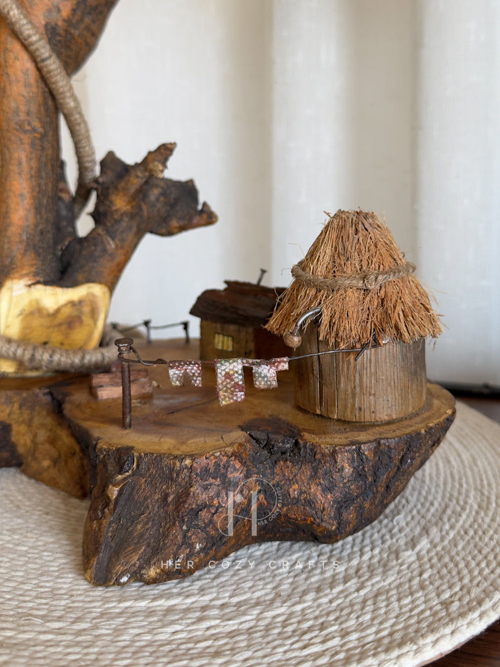 Nestwood Yard Lamp - Tall driftwood stem with hanging bulb and hut scene