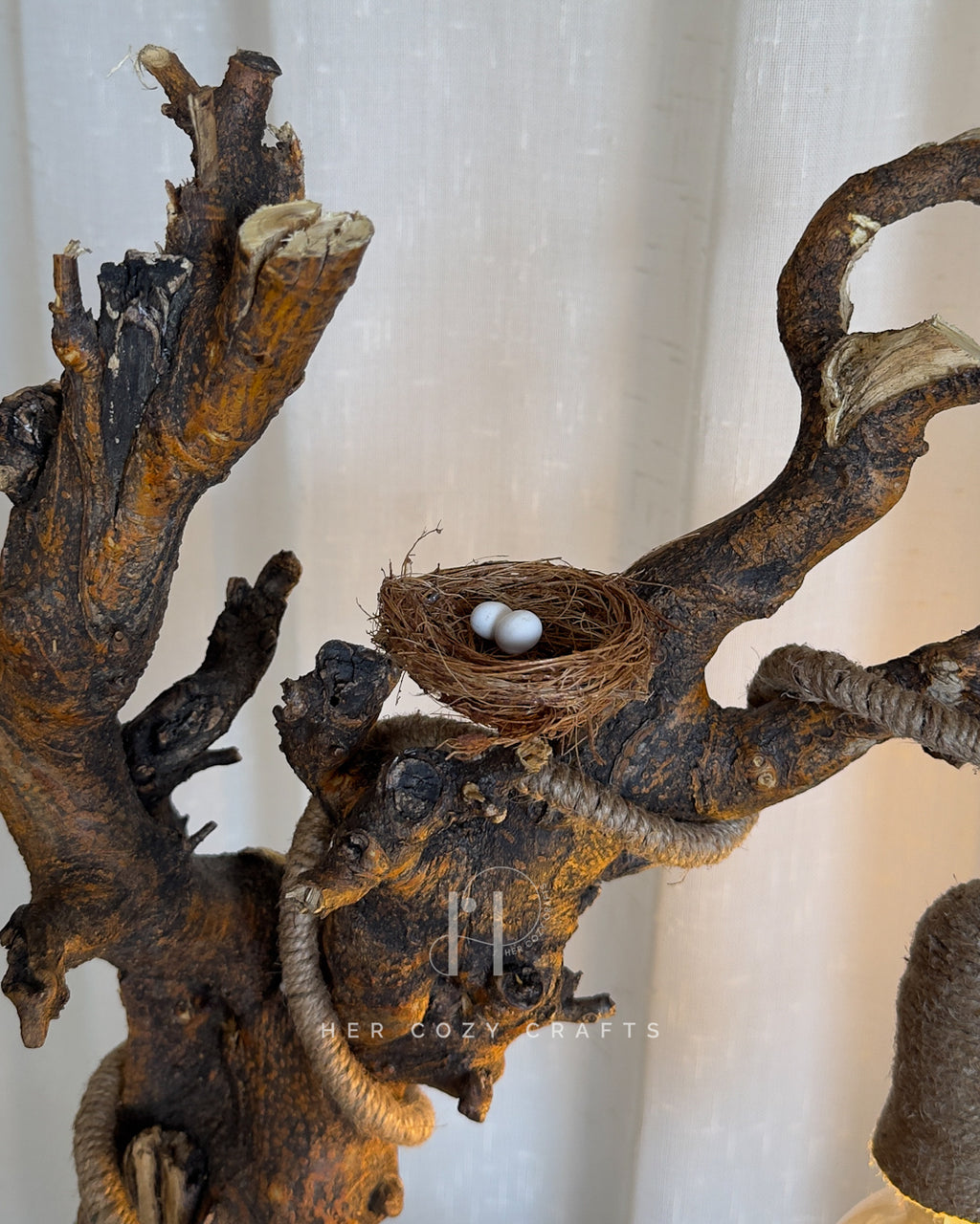 Nestwood Yard Lamp - Tall driftwood stem with hanging bulb and hut scene