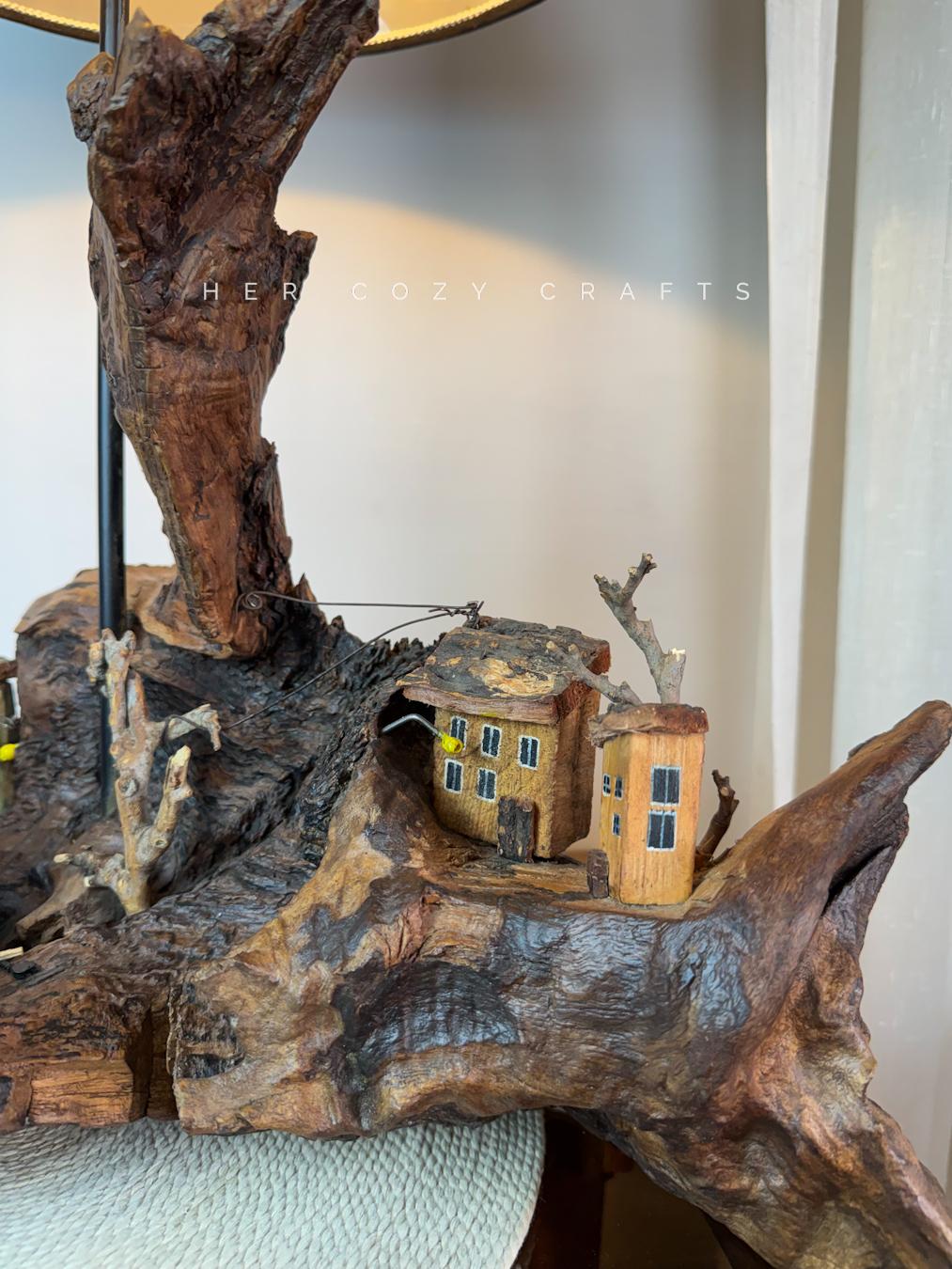 Hilltop Village Lamp - Organic driftwood table lamp with miniature homes and warm light