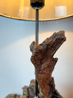Hilltop Village Lamp - Organic driftwood table lamp with miniature homes and warm light