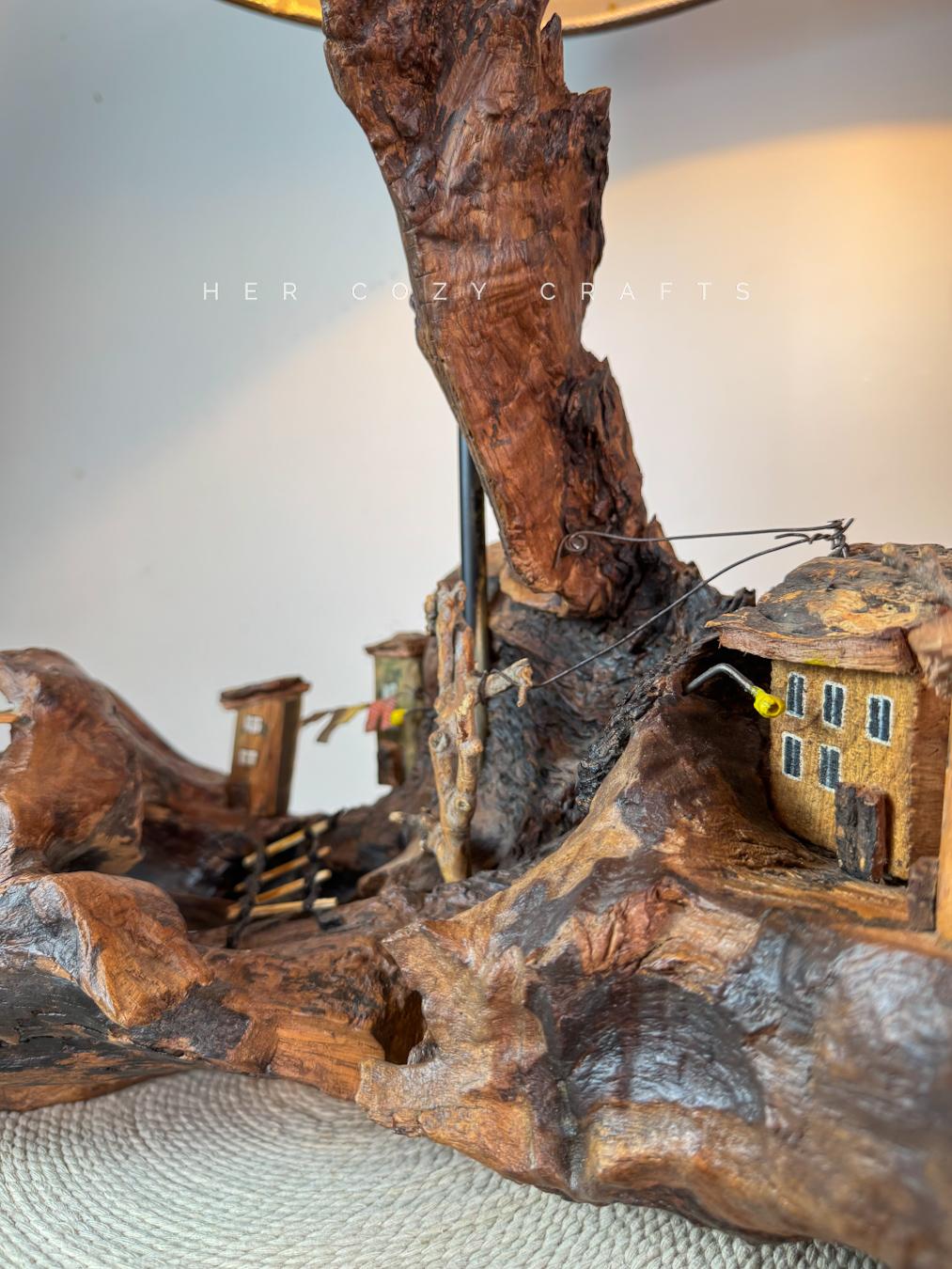 Hilltop Village Lamp - Organic driftwood table lamp with miniature homes and warm light