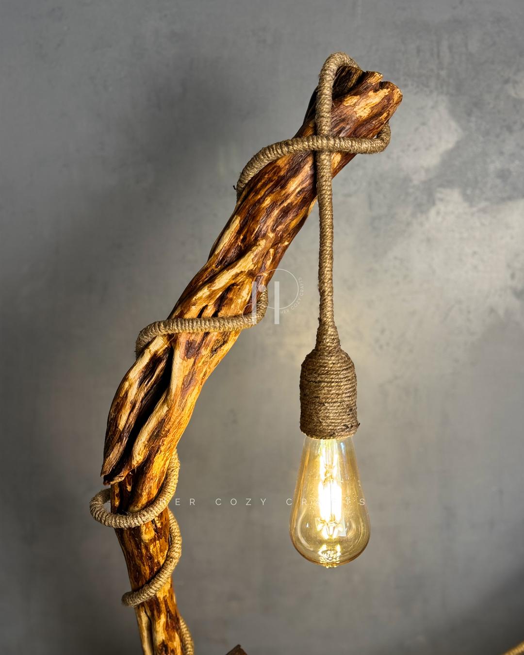 Cottage Climb Lamp - Tall natural wood stem with rope-wrapped hanging bulb and village base