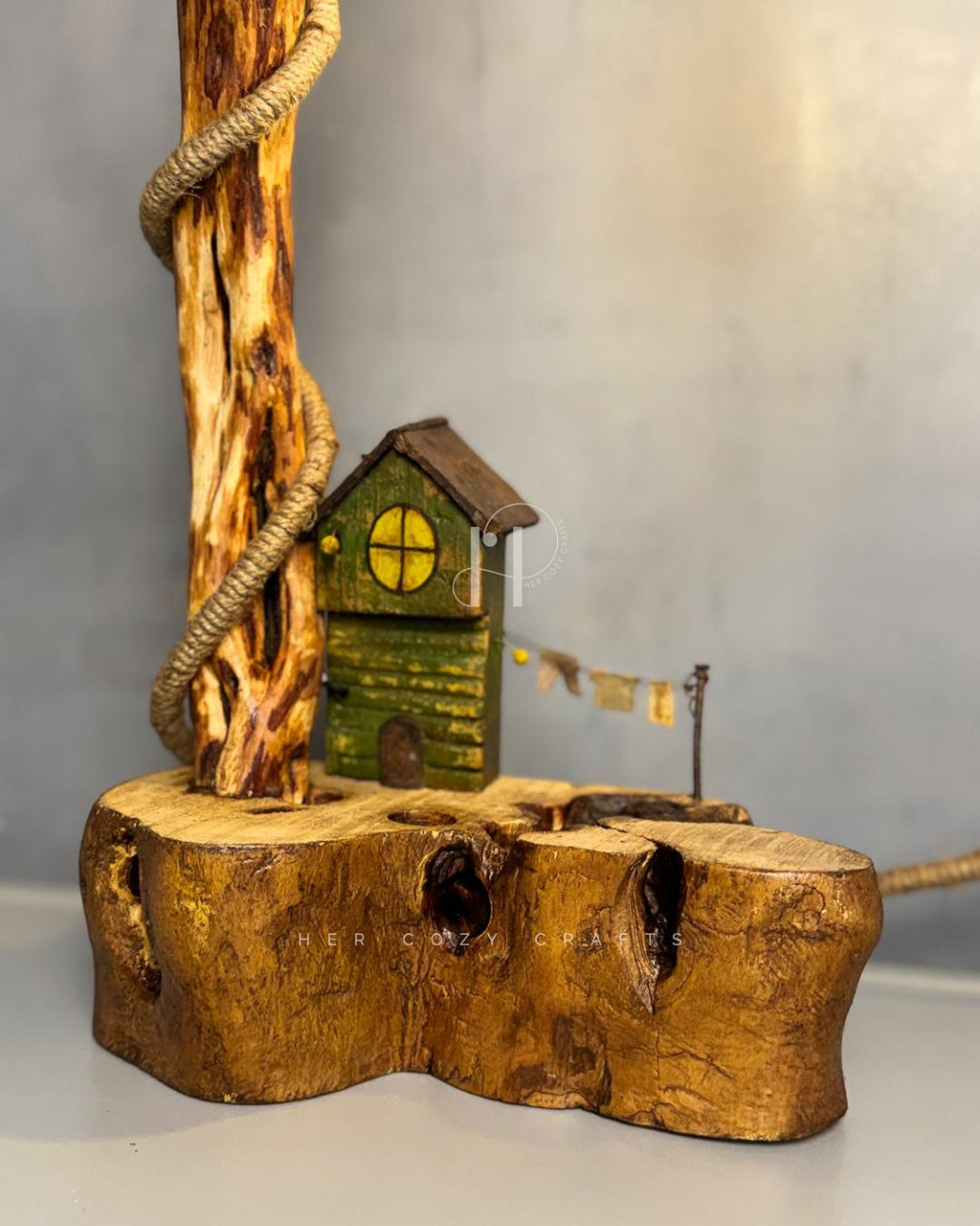 Cottage Climb Lamp - Tall natural wood stem with rope-wrapped hanging bulb and village base