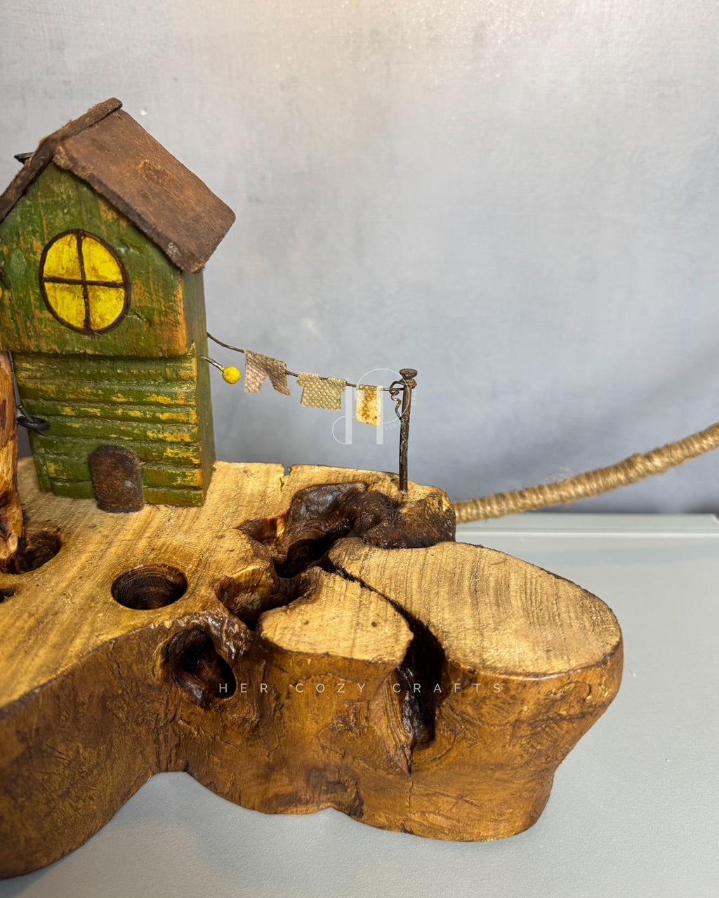 Cottage Climb Lamp - Tall natural wood stem with rope-wrapped hanging bulb and village base