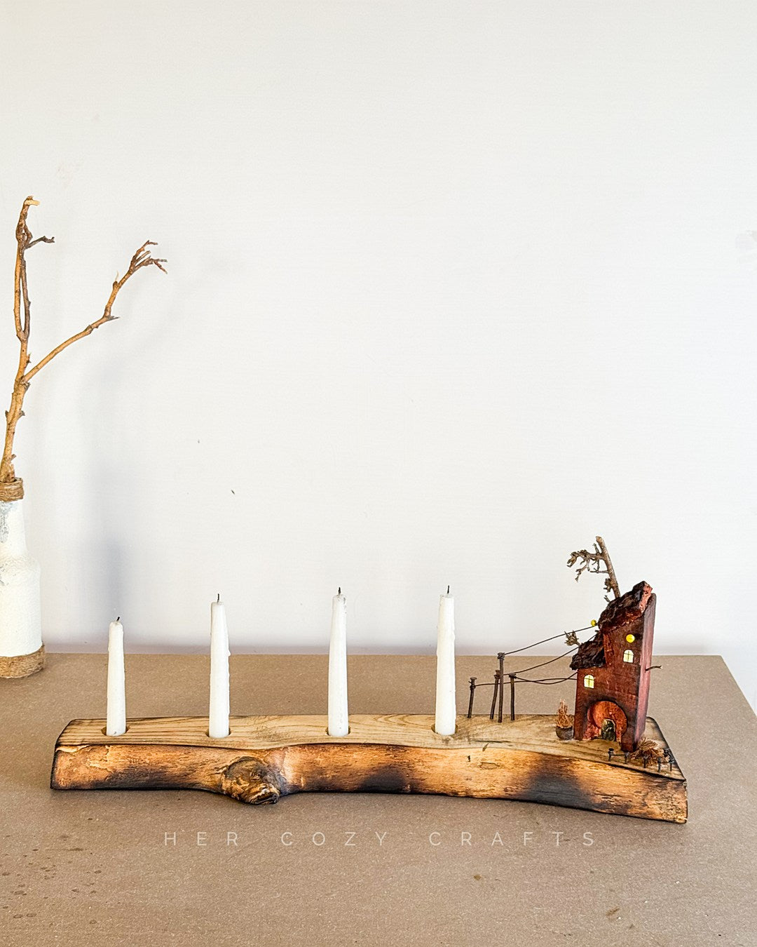 The long curved driftwood holder with 4 candles