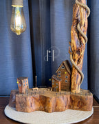 The Woodland Haven Lamp — Sculptural Driftwood with a Storybook Village