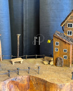 The Woodland Haven Lamp — Sculptural Driftwood with a Storybook Village