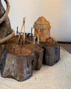 Wildwood Arc Lamp-Natural signature table lamp Base with Rope-Wrapped Hanging Bulb & Miniature Village Detail
