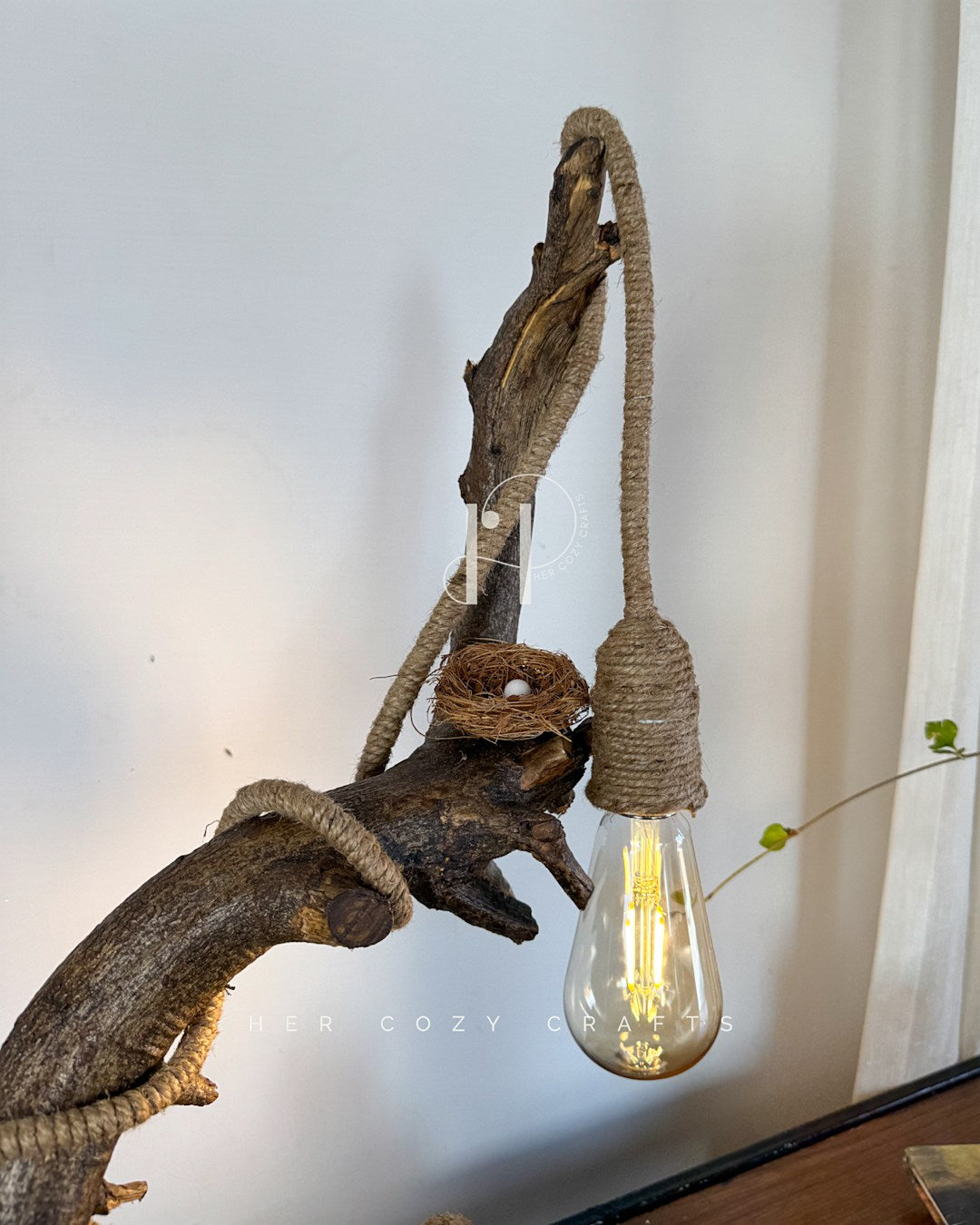 Wildwood Arc Lamp-Natural signature table lamp Base with Rope-Wrapped Hanging Bulb & Miniature Village Detail