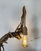 Wildwood Arc Lamp-Natural signature table lamp Base with Rope-Wrapped Hanging Bulb & Miniature Village Detail