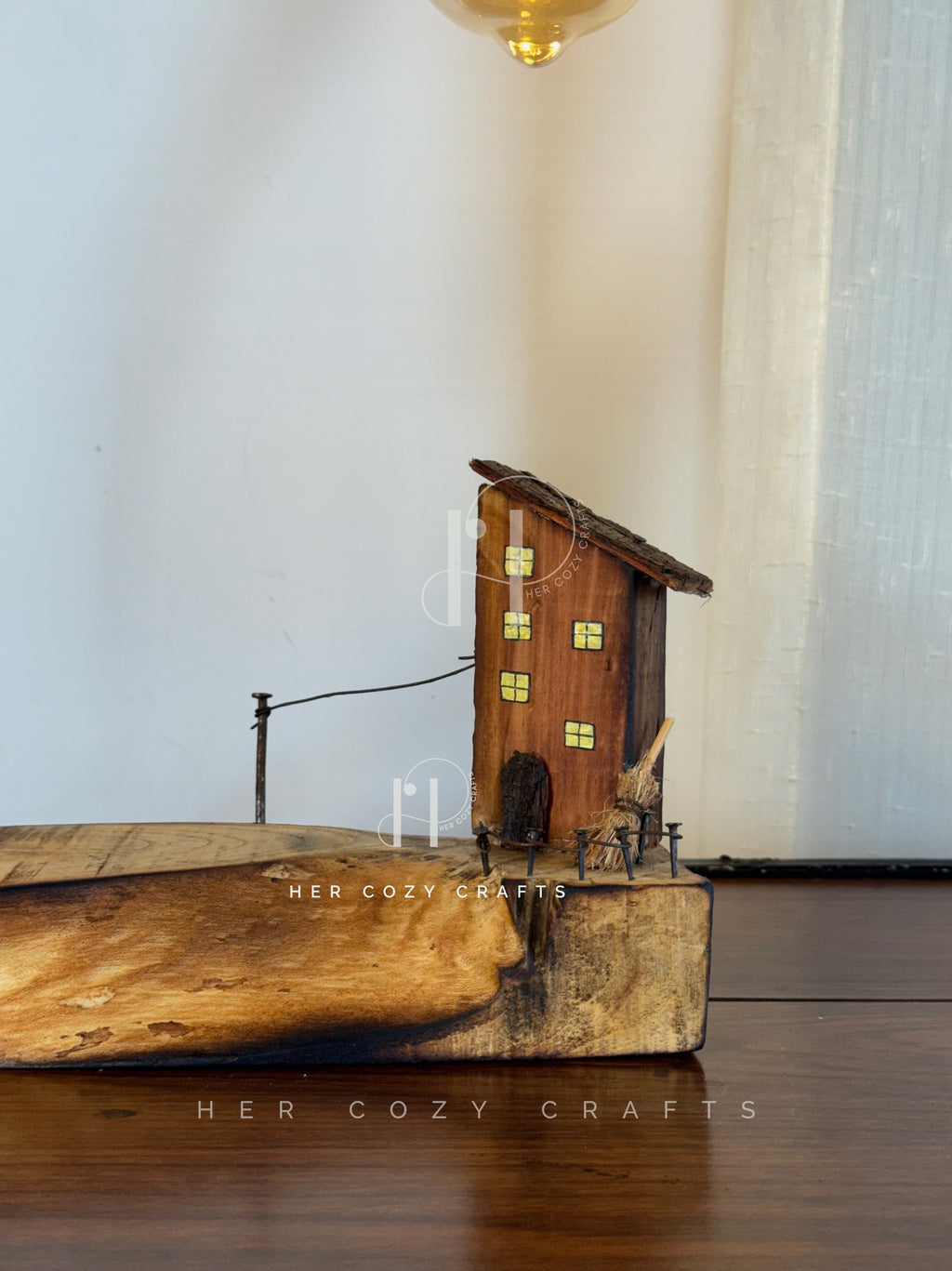 Storywood Lamp - Curved Driftwood Frame with Miniature Cottage Scene & Hanging Edison Bulb

Description: